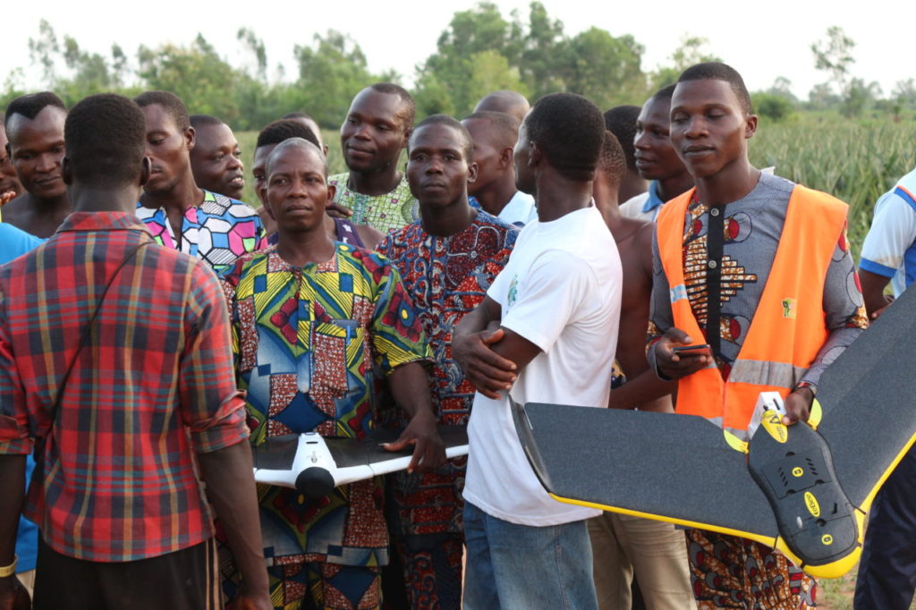 Benin Flying Labs workshop participants discussing drones services for pineapple production